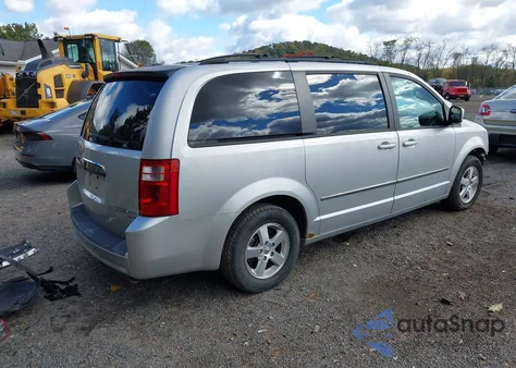 2010 Dodge Grand Caravan Sxt z USA, uszkodzony, nr VIN 2D4RN5D11AR107738
